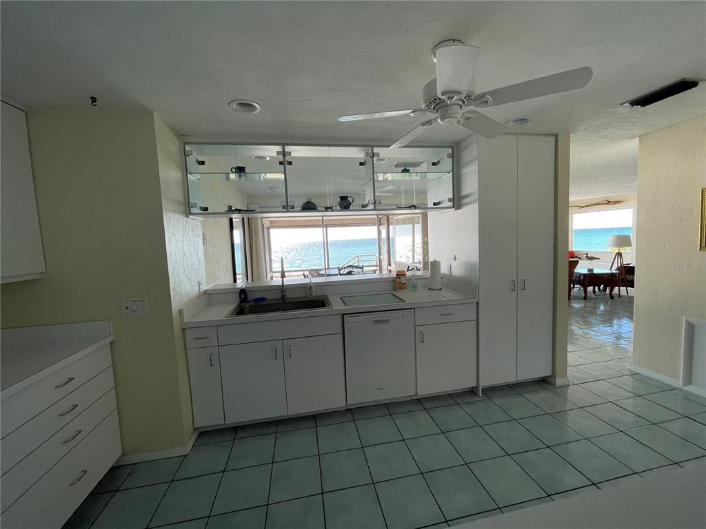 2709 Casey Key Road Nokomis, FL 34275 - Photo 19 of 40 a bathroom with a sink vanity and mirror