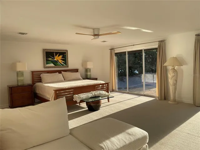 a view of a backyard of the house