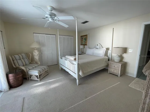 a bedroom with a bed and furniture