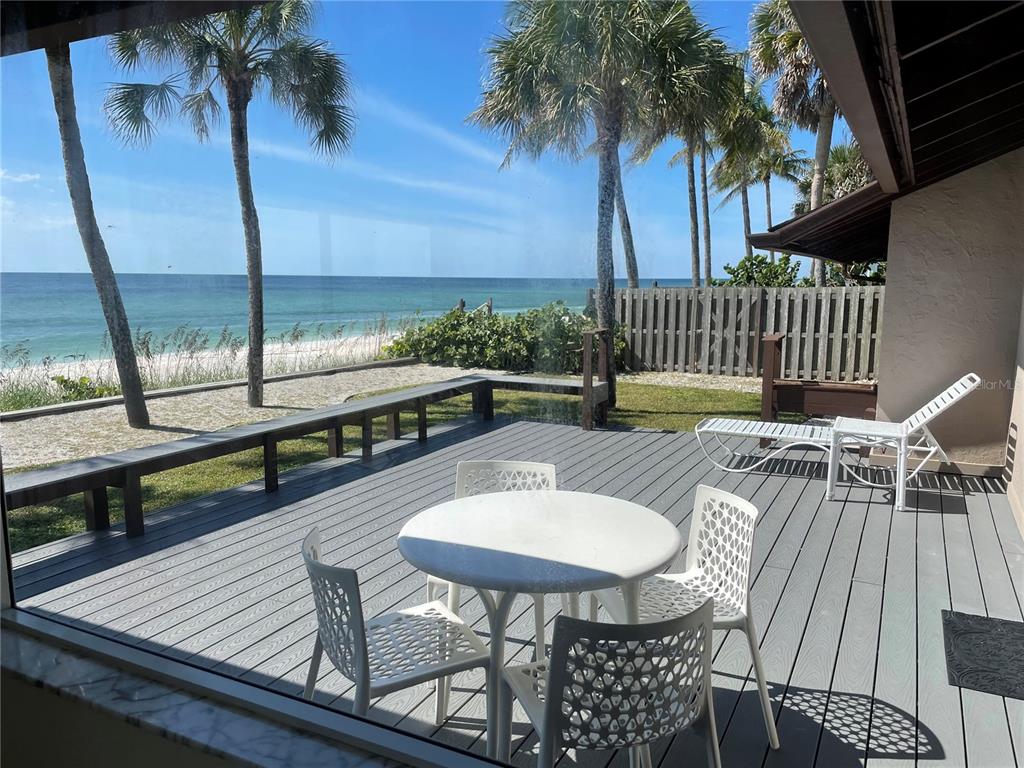 2709 Casey Key Road Nokomis, FL 34275 - Photo 8 of 40 a view of a balcony with furniture