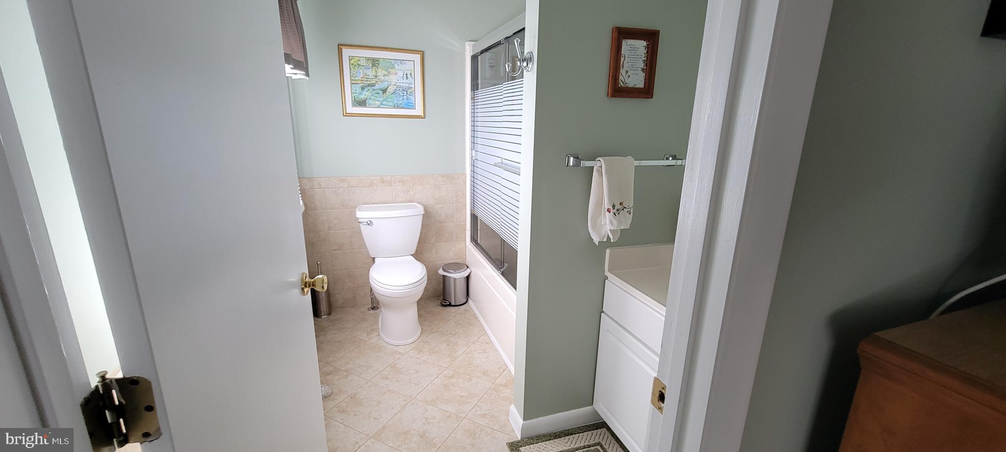 1360 Calvert Road Chester, MD 21619 - Photo 13 of 66 a view of a bathroom with a toilet