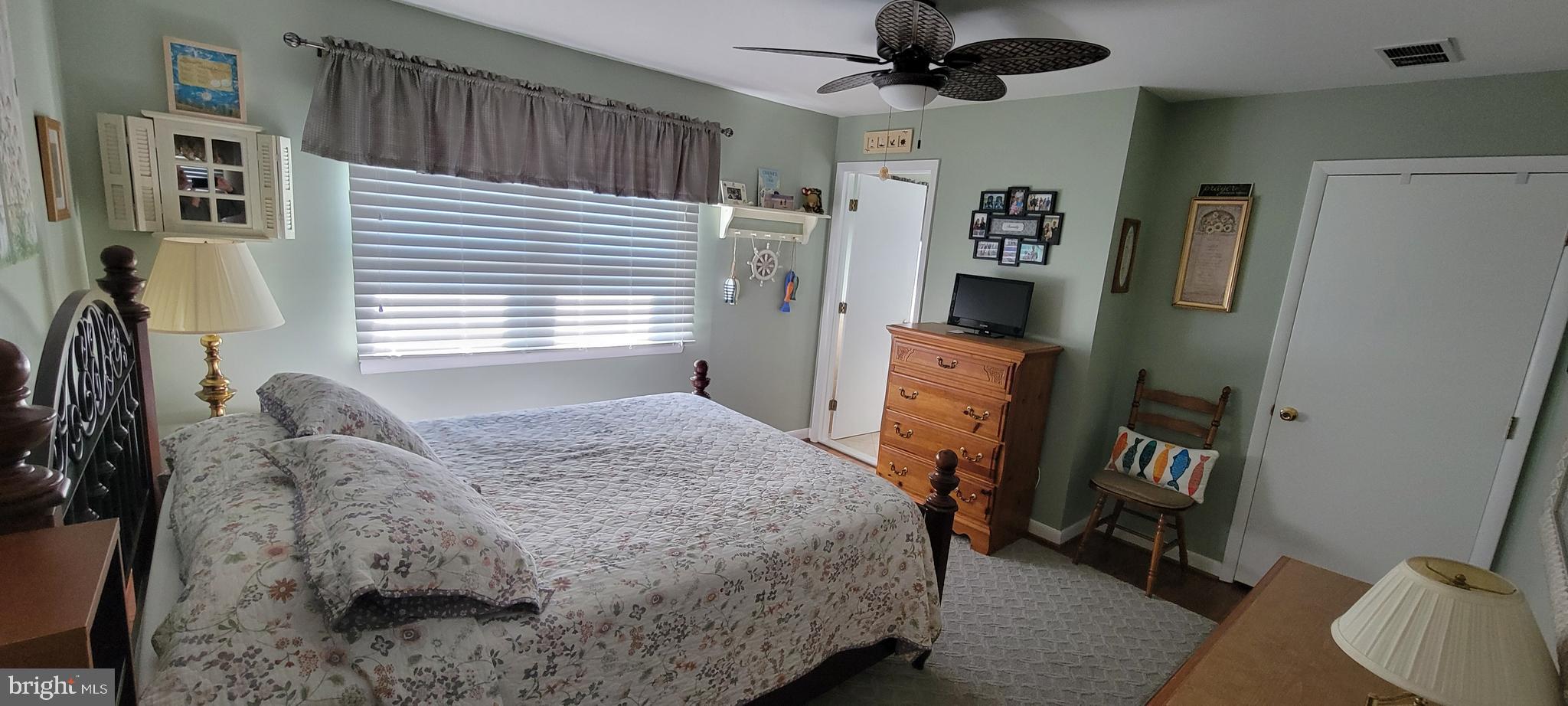 1360 Calvert Road Chester, MD 21619 - Photo 15 of 66 a bedroom with a bed furniture and a window