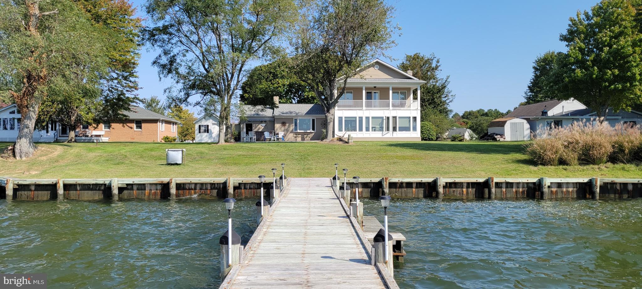 1360 Calvert Road Chester, MD 21619 - Photo 20 of 66 a view of a house with backyard porch and sitting area