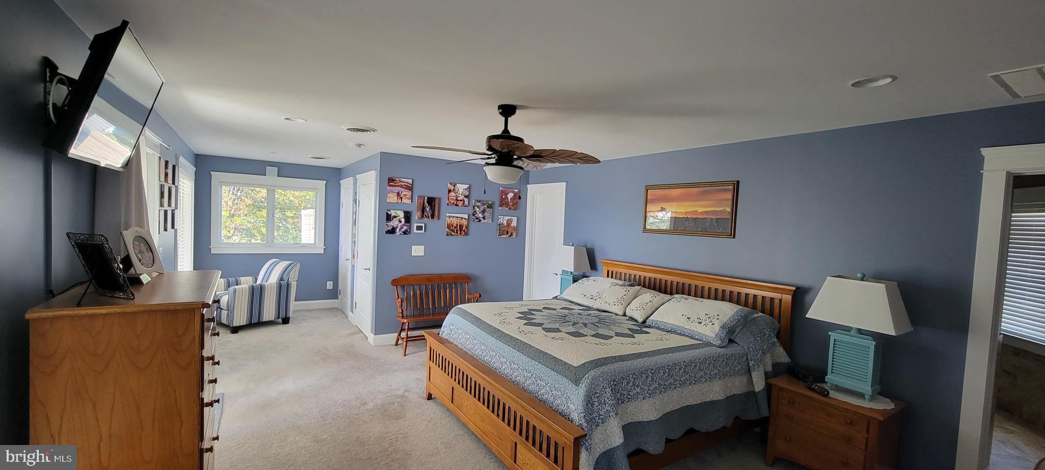 1360 Calvert Road Chester, MD 21619 - Photo 24 of 66 a bedroom with a bed and a flat screen tv