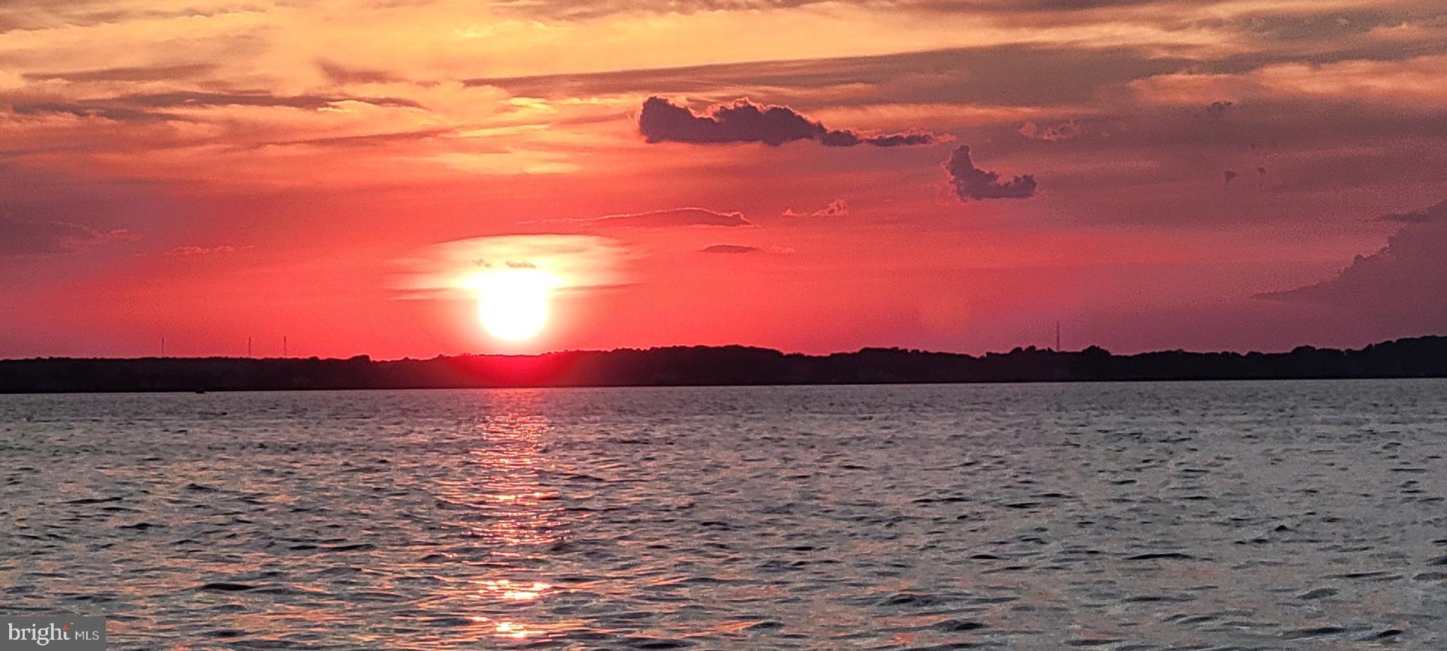 1360 Calvert Road Chester, MD 21619 - Photo 50 of 66 a view of an ocean beach and a mountain