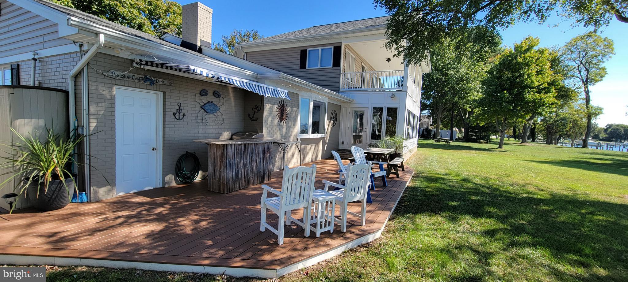 1360 Calvert Road Chester, MD 21619 - Photo 5 of 66 a view of a house with backyard and sitting area