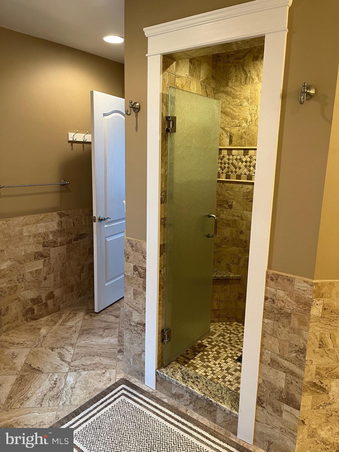 1360 Calvert Road Chester, MD 21619 - Photo 58 of 66 a bathroom with a glass shower door