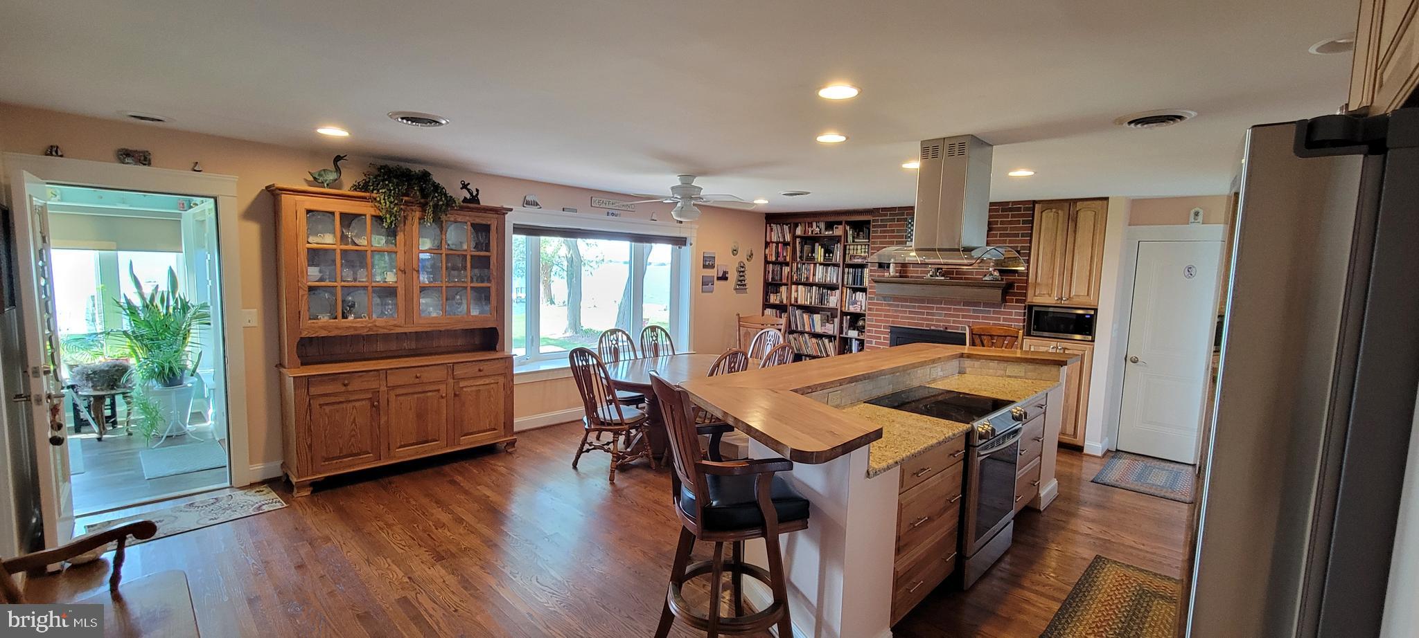 1360 Calvert Road Chester, MD 21619 - Photo 6 of 66 a kitchen with stainless steel appliances granite countertop a refrigerator and a stove top oven