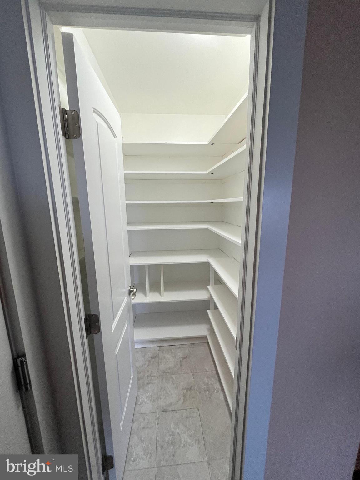 1360 Calvert Road Chester, MD 21619 - Photo 66 of 66 a view of staircase with white walls and a window