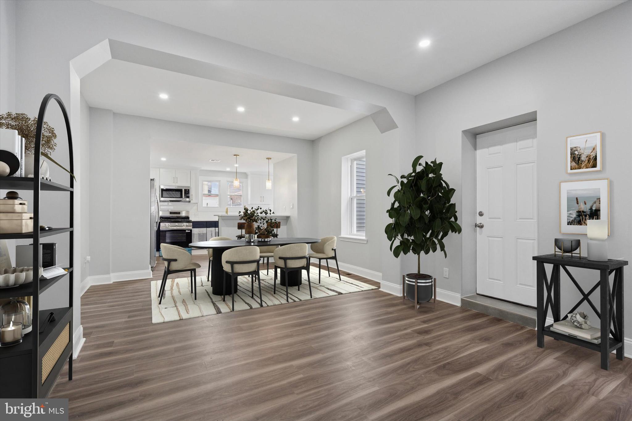 3448 Amber Street Philadelphia, PA 19134 - Photo 1 of 29 a view of a dining room with furniture and wooden floor