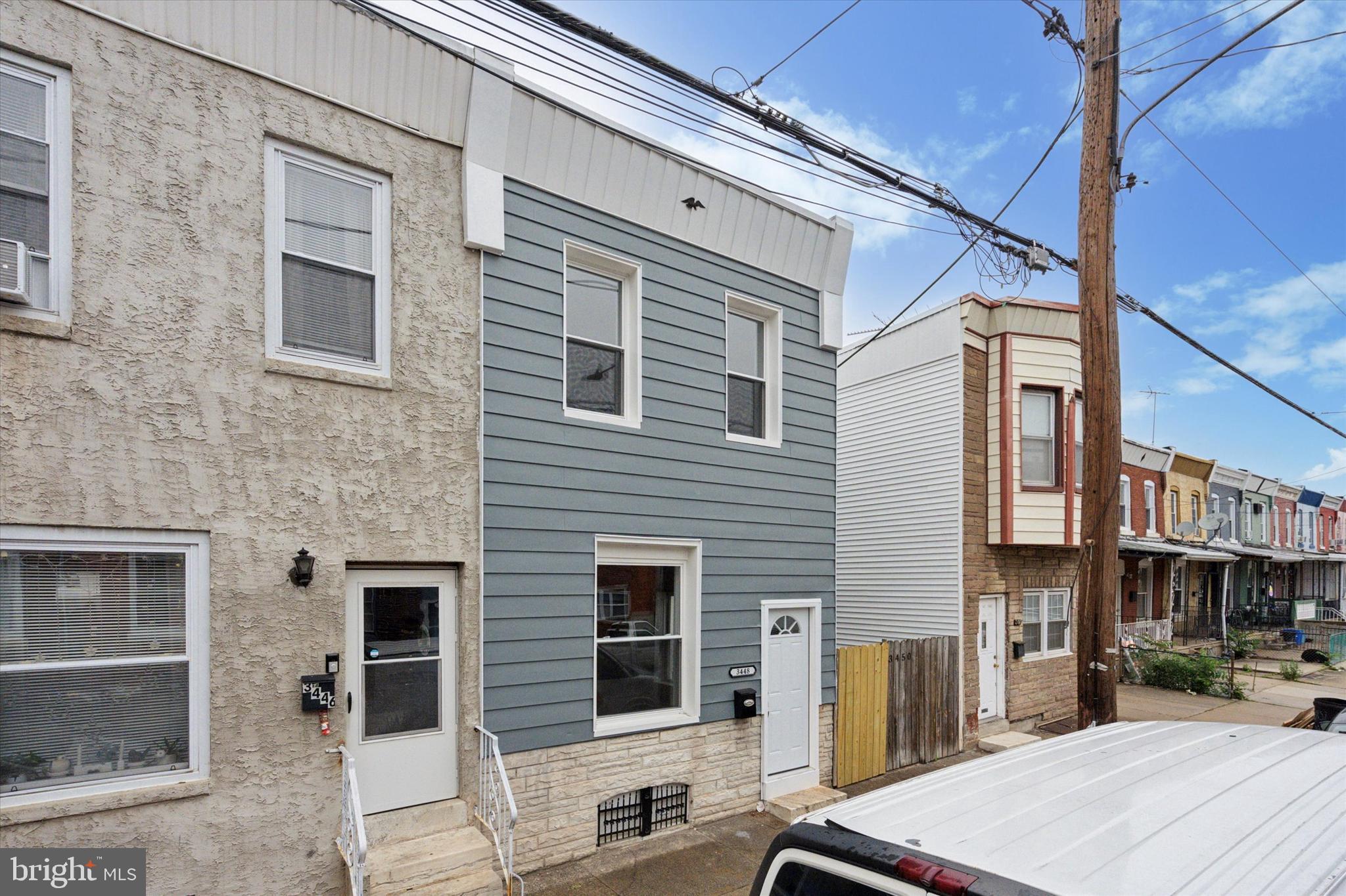 3448 Amber Street Philadelphia, PA 19134 - Photo 2 of 29 a view of a brick building with many windows