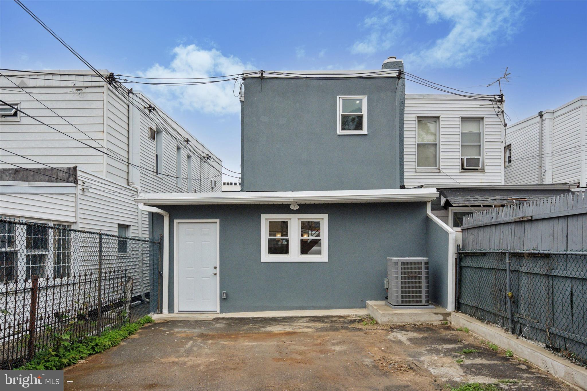 3448 Amber Street Philadelphia, PA 19134 - Photo 29 of 29 a front view of a house with a garage