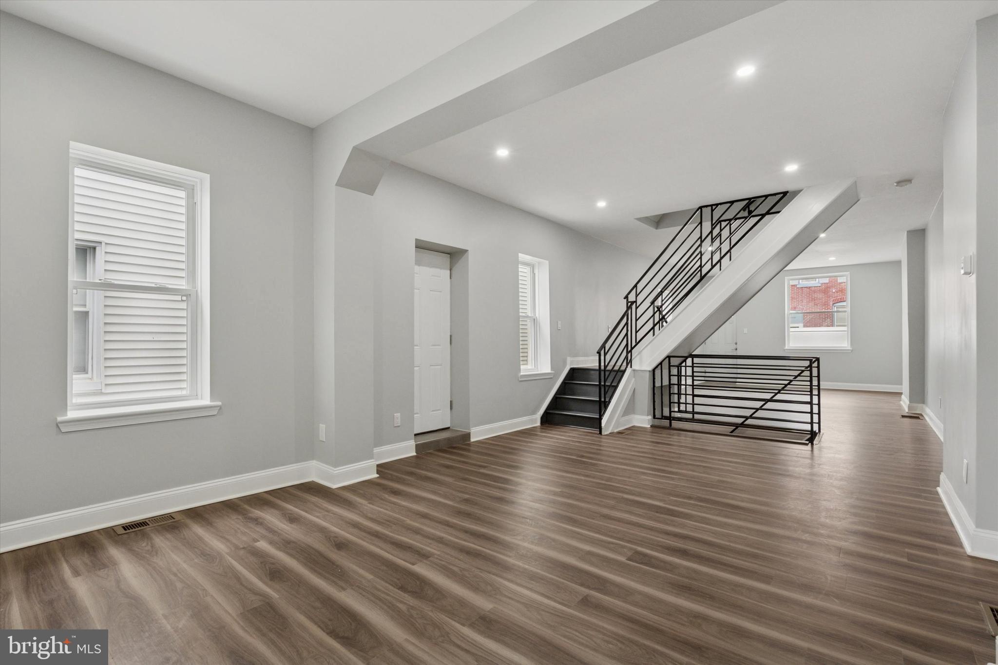 3448 Amber Street Philadelphia, PA 19134 - Photo 7 of 29 a view of an entryway with wooden floor and staircase
