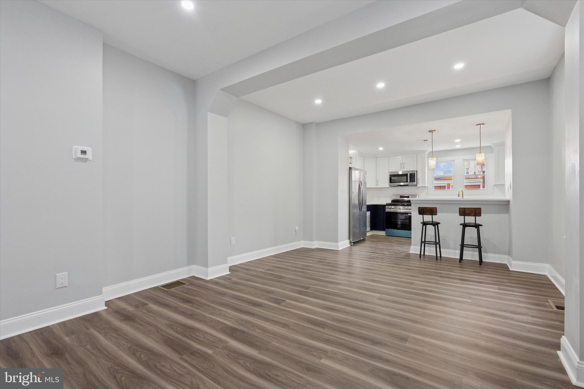 3448 Amber Street Philadelphia, PA 19134 - Photo 10 of 29 a view of kitchen with furniture and wooden floor