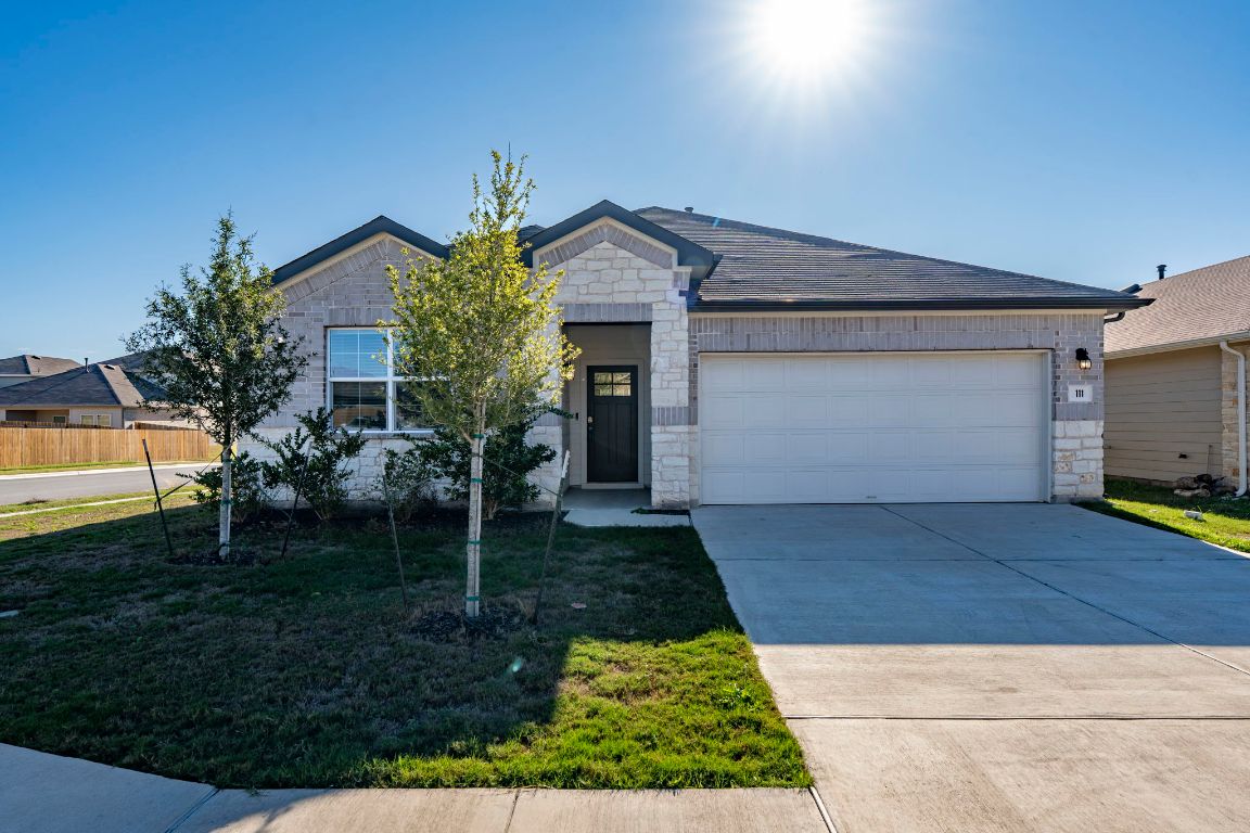 a house view with a garden space