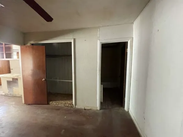 an empty room with closet