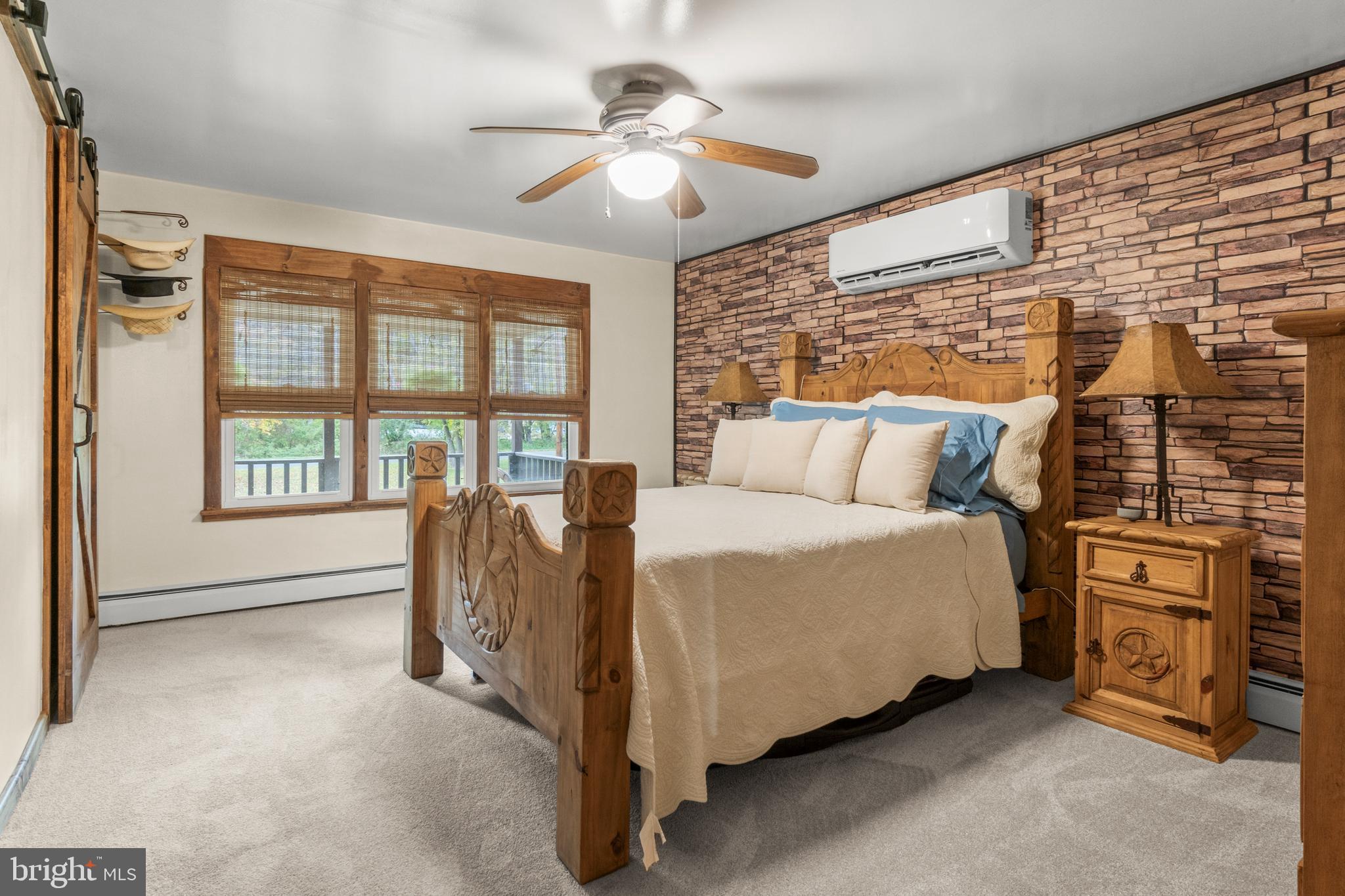 108 New Brooklyn Road Sicklerville, NJ 08081 - Photo 16 of 25 a spacious bedroom with a bed and a chandelier