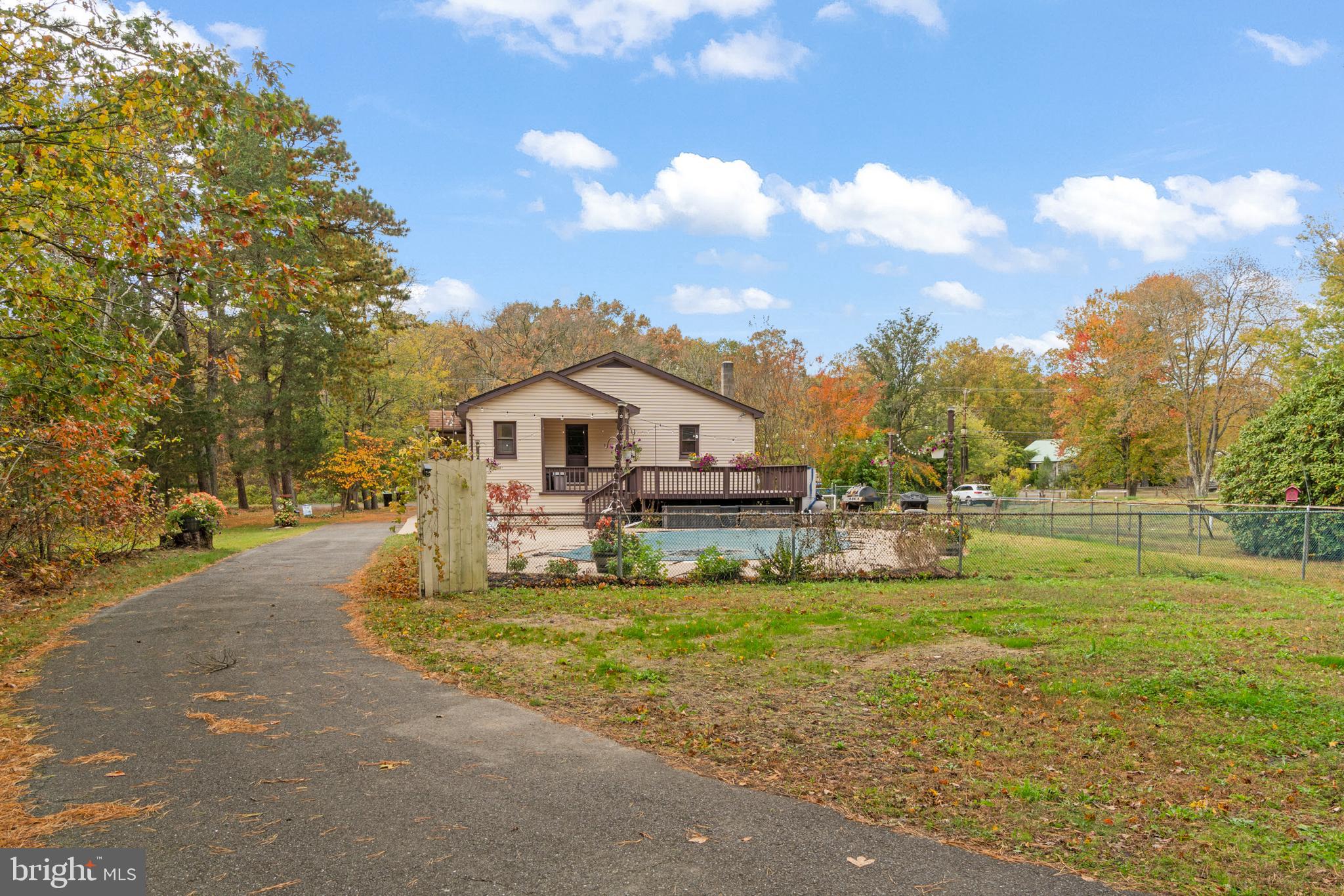 108 New Brooklyn Road Sicklerville, NJ 08081 - Photo 20 of 25 a view of a house with yard and sitting area