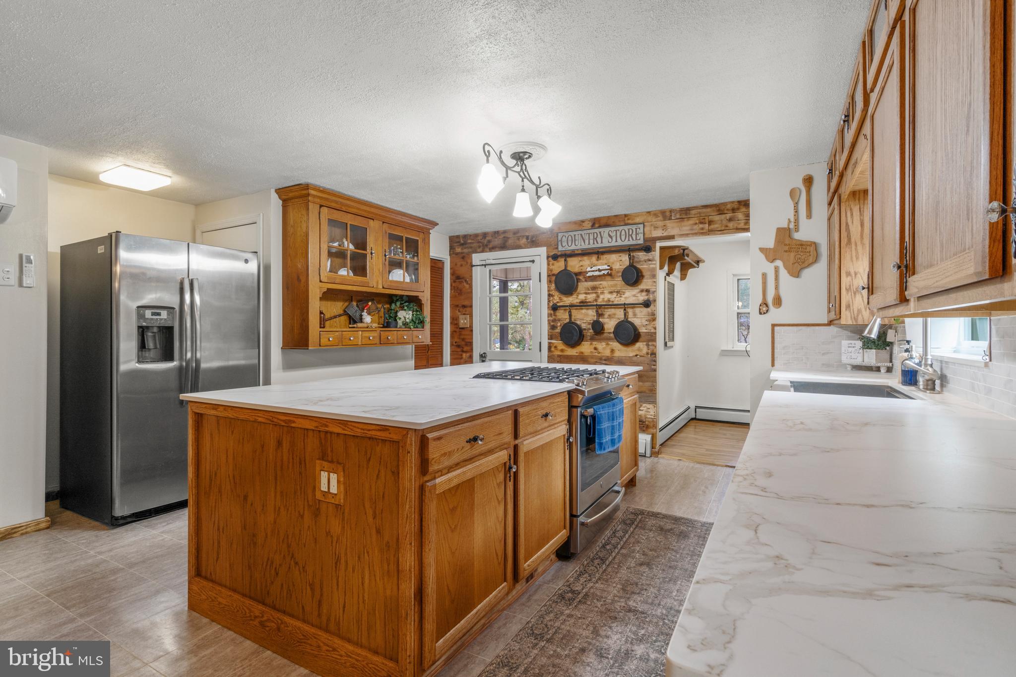 108 New Brooklyn Road Sicklerville, NJ 08081 - Photo 10 of 25 a kitchen with stainless steel appliances granite countertop a stove and a refrigerator