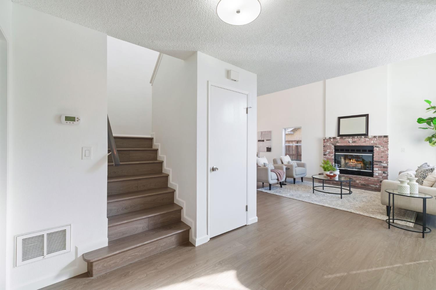 9342 North Archie Avenue Fresno, CA 93720 - Photo 19 of 36 a view of a livingroom with furniture and a livingroom with furniture