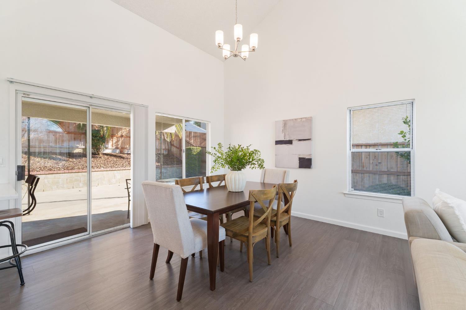 9342 North Archie Avenue Fresno, CA 93720 - Photo 8 of 36 a view of a dining room with furniture window and outside view