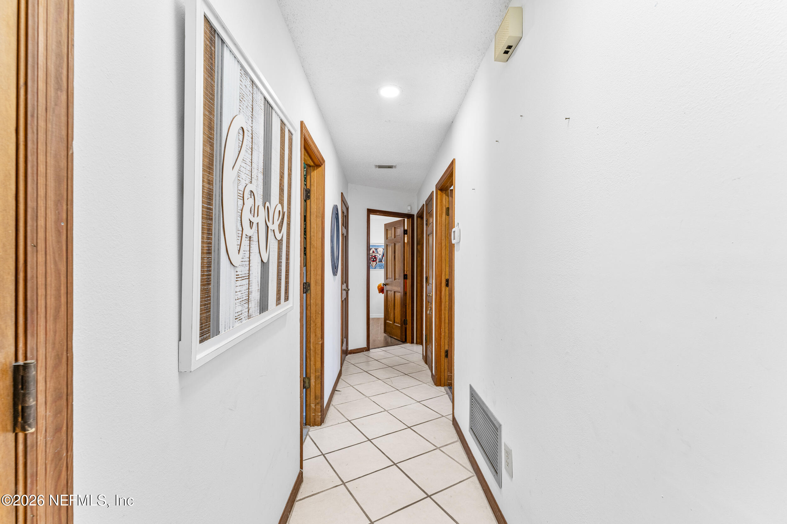 701 16th Street St. Augustine, FL 32080 - Photo 19 of 39 a view of a hallway