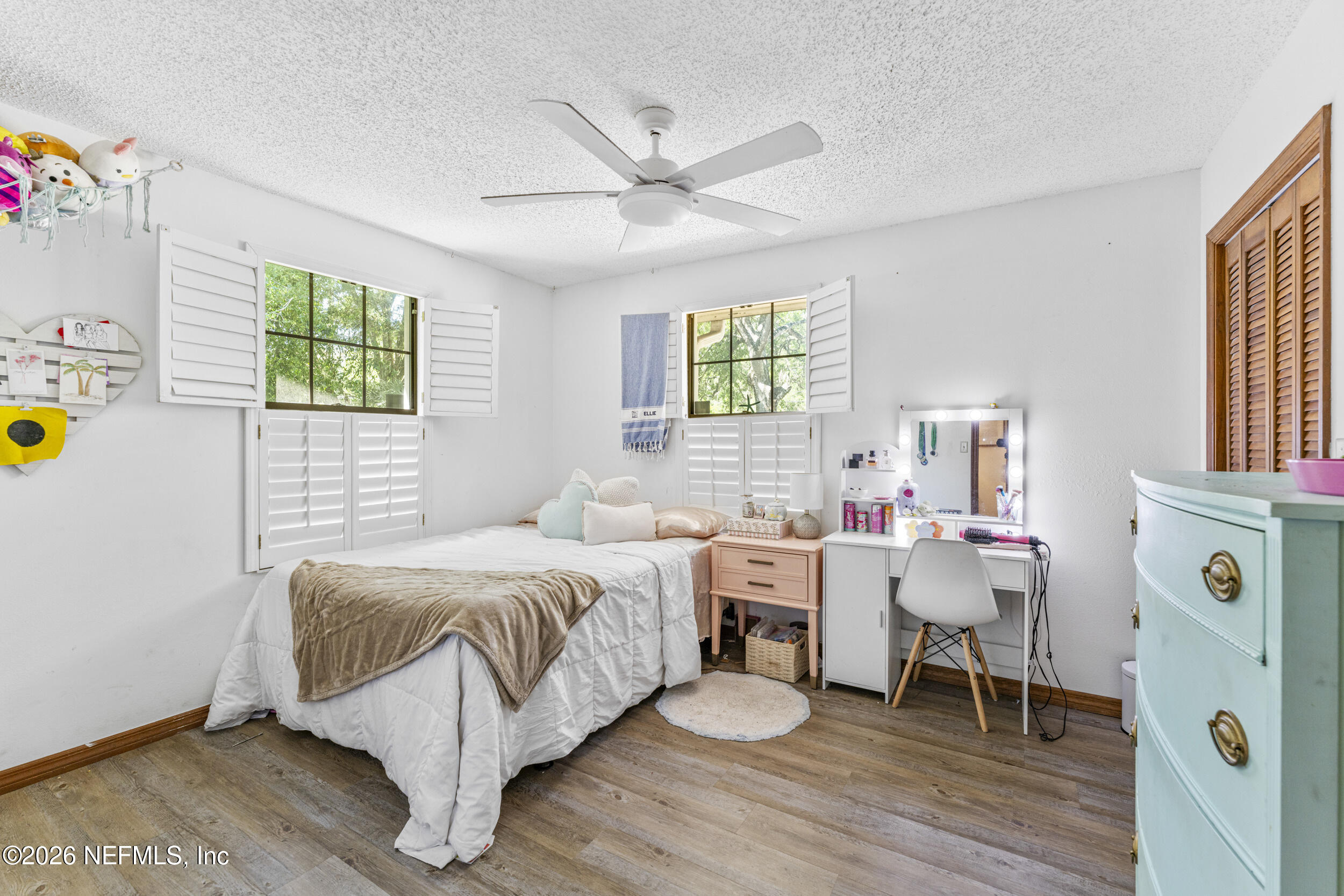 701 16th Street St. Augustine, FL 32080 - Photo 22 of 39 a bed room with a bed and a window