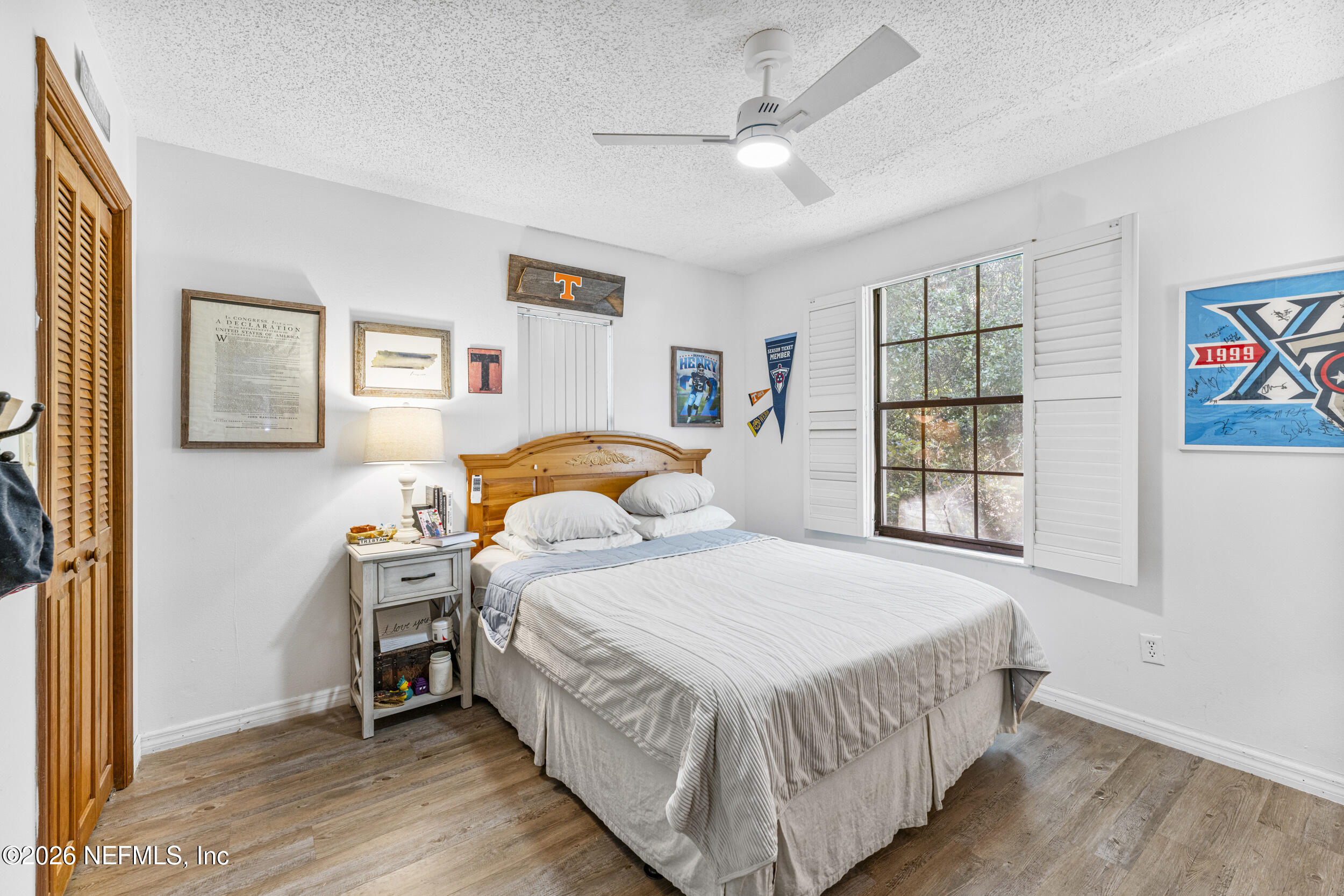 701 16th Street St. Augustine, FL 32080 - Photo 24 of 39 a bedroom with a bed and a window