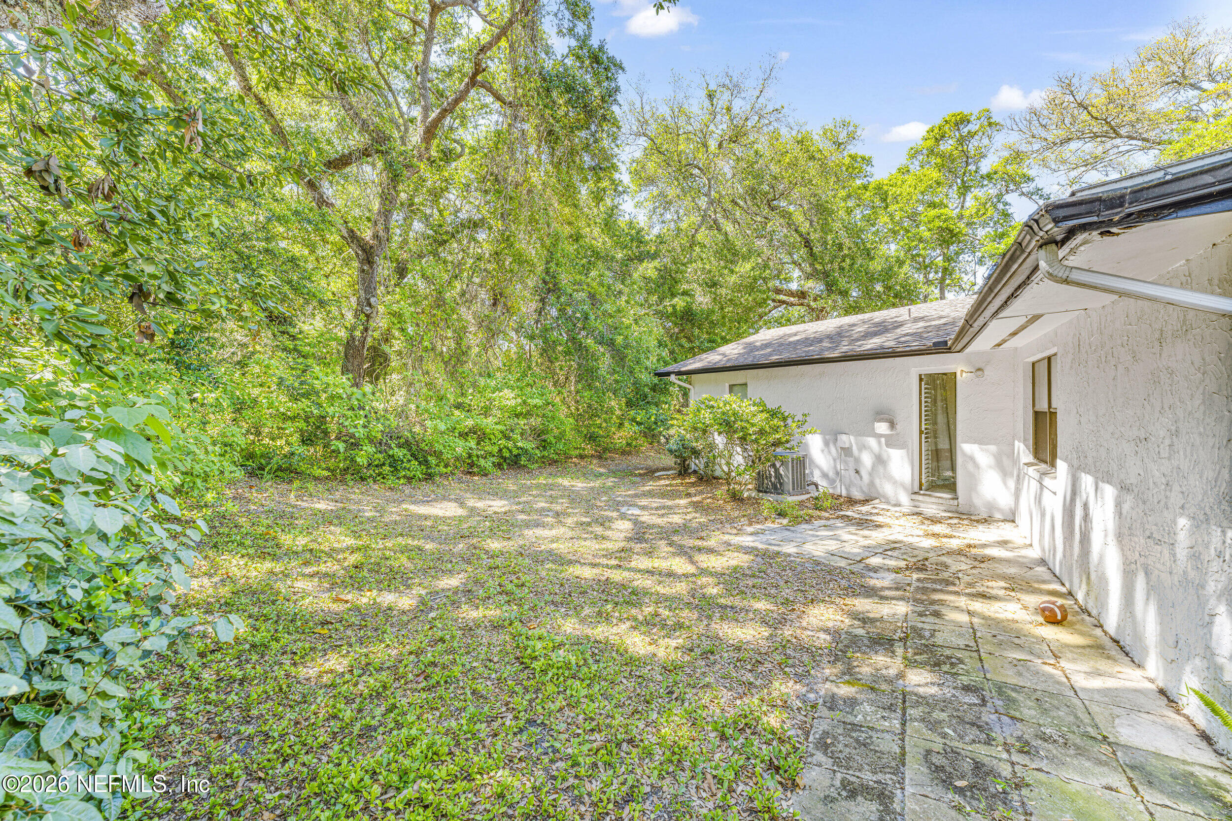 701 16th Street St. Augustine, FL 32080 - Photo 32 of 39 a view of a house with a tree