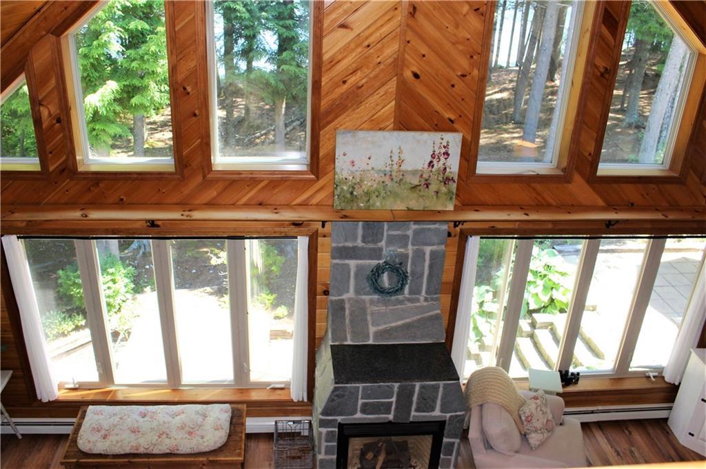 562 Springy Pond Road Ellsworth, ME 04605 - Photo 18 of 33 Lots of glass and light!