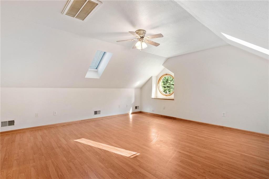 216 Marshall Road Oakdale, PA 15071 - Photo 18 of 25 an empty room with a window and a ceiling fan