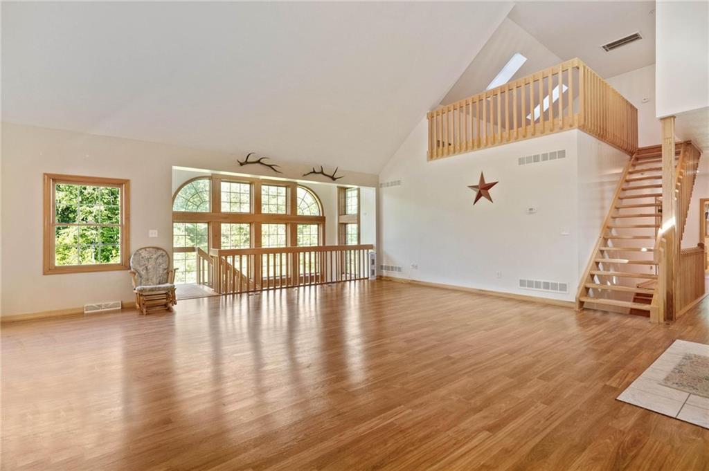 216 Marshall Road Oakdale, PA 15071 - Photo 5 of 25 wooden floor in an empty room with a window