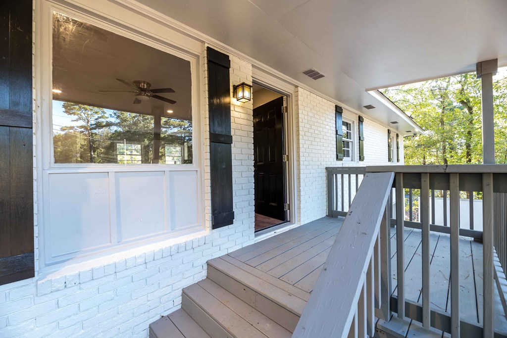 4810 Toney Drive Columbus, GA 31903 - Photo 3 of 17 a view of a porch with wooden floor and outdoor space