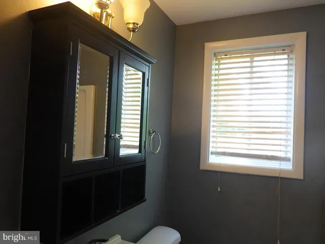 a view of a house that has a window in it