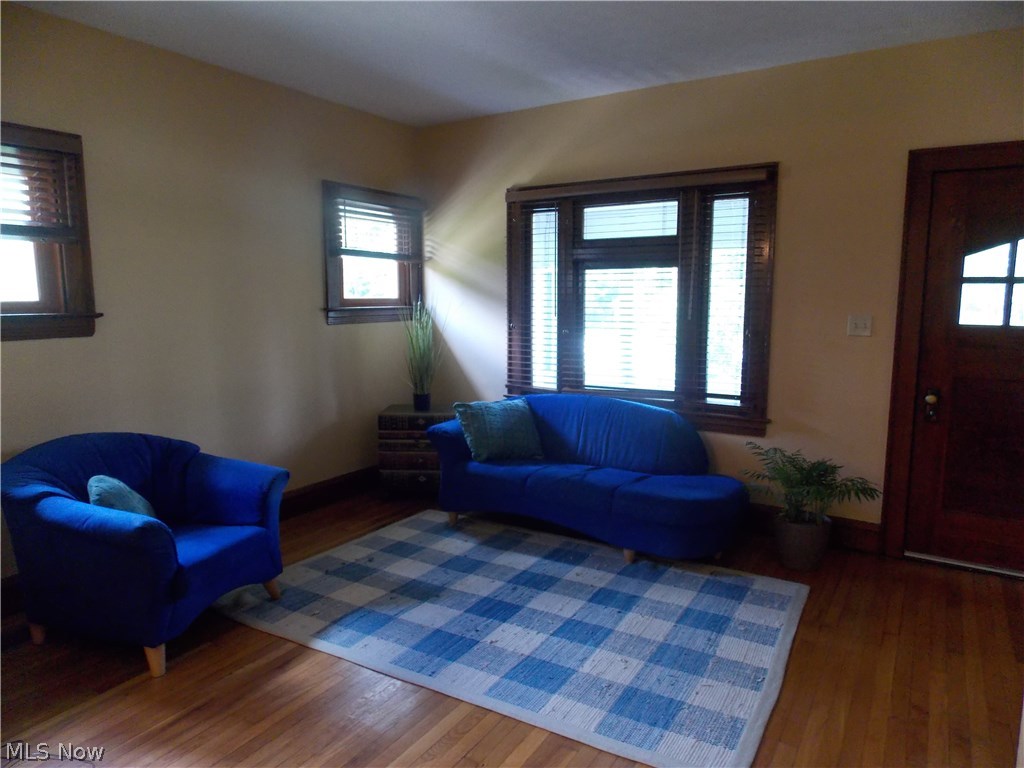 9231 Ridge Road North Royalton, OH 44133 - Photo 2 of 31 Living room has hardwood floor and lovely oak woodwork/doors.