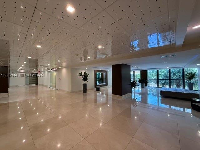 540 Brickell Key Drive, Unit 1024 Miami, FL 33131 - Photo 2 of 28 a view of a lobby with furniture and a garage