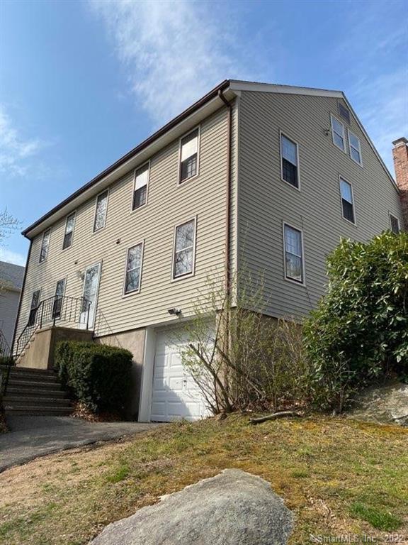 63 Schofield Road, Unit 46 Willington, CT 06279 - Photo 1 of 1 a house view with a swimming pool