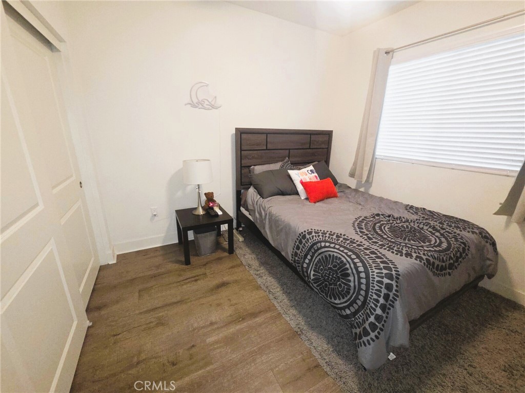 6741 Rhea Court Reseda, CA 91335 - Photo 15 of 18 a bedroom with a bed and closet