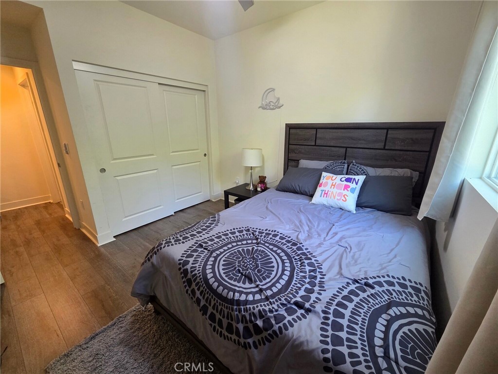 6741 Rhea Court Reseda, CA 91335 - Photo 16 of 18 a bed sitting in a bedroom next to a window