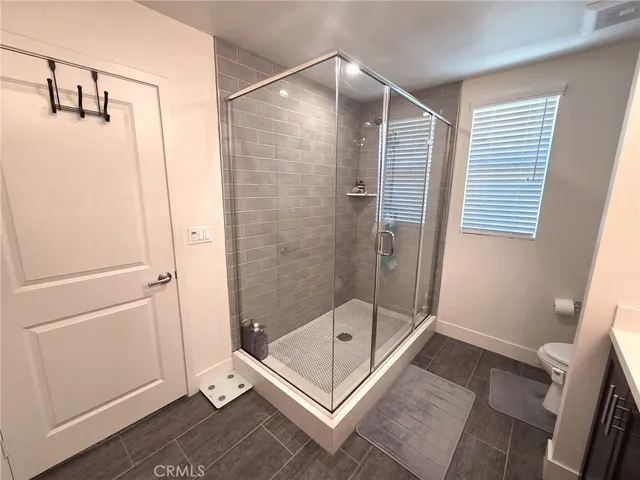 a bathroom with a bath tub and a shower