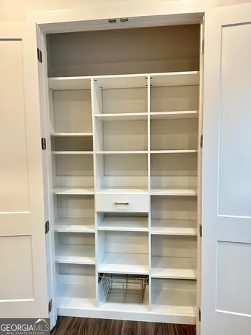 a view of a room with shelves