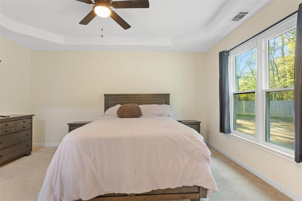 58 Quail Run Cartersville, GA 30120 - Photo 15 of 44 a bedroom with a bed and window