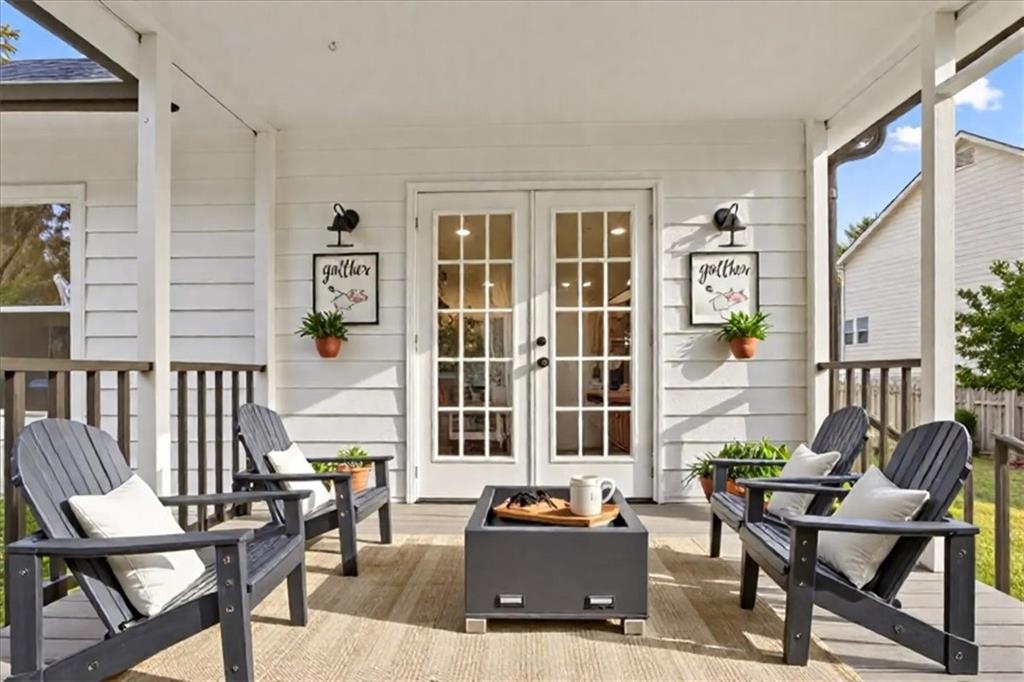 58 Quail Run Cartersville, GA 30120 - Photo 26 of 44 a living room with furniture and large windows