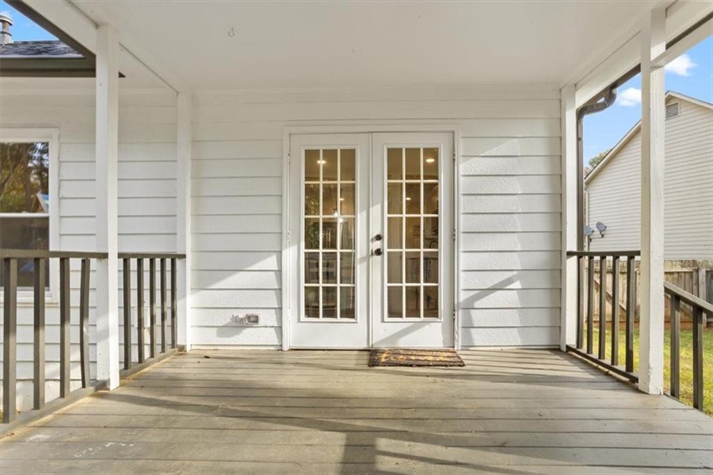 58 Quail Run Cartersville, GA 30120 - Photo 27 of 44 a view of a brick house with wooden floor and windows