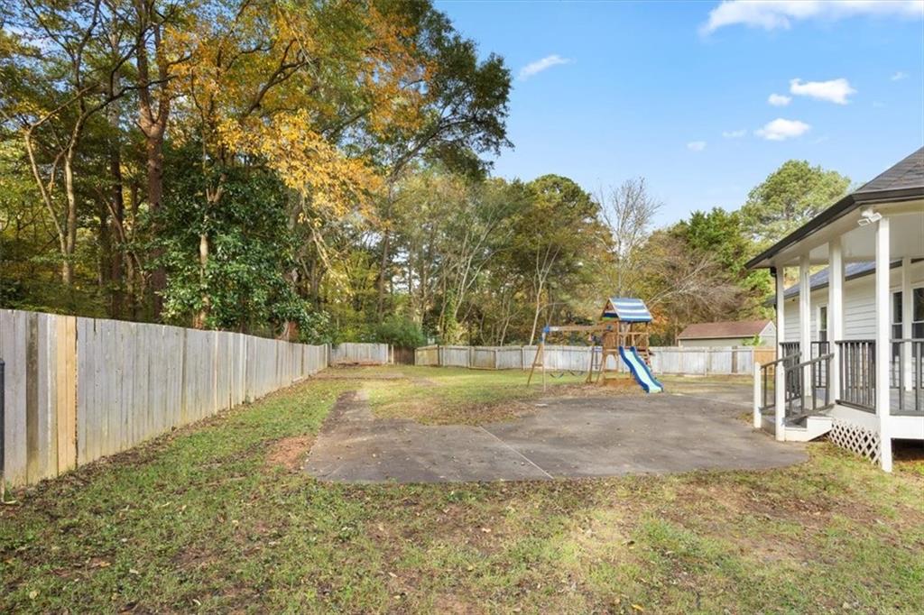 58 Quail Run Cartersville, GA 30120 - Photo 32 of 44 a view of a backyard with trees