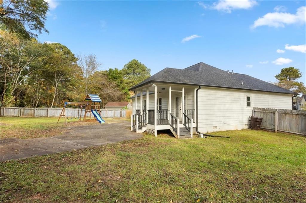 58 Quail Run Cartersville, GA 30120 - Photo 33 of 44 a view of a house with backyard and a tree