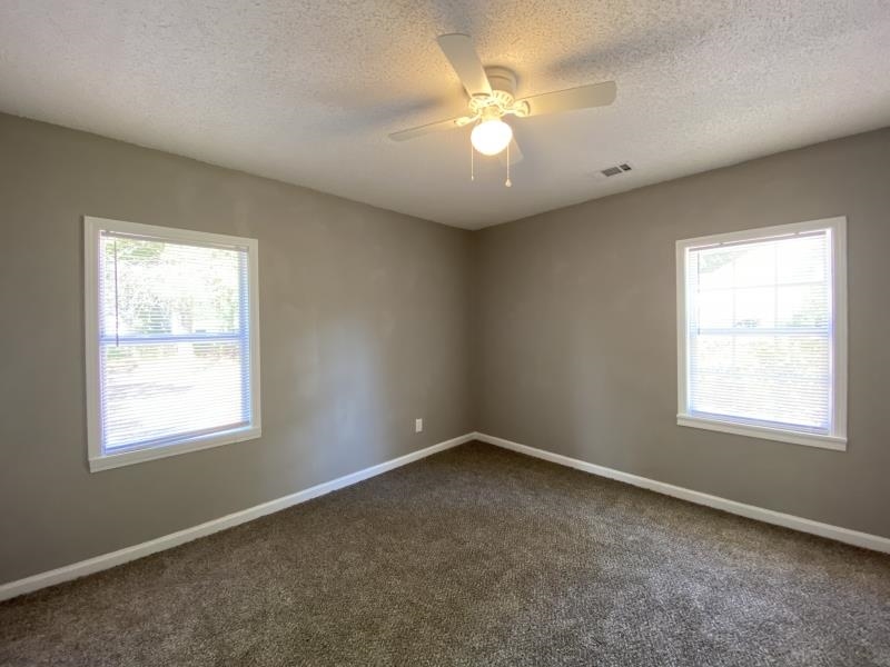 2119 Pendleton Street Memphis, TN 38114 - Photo 5 of 8 an empty room with a window