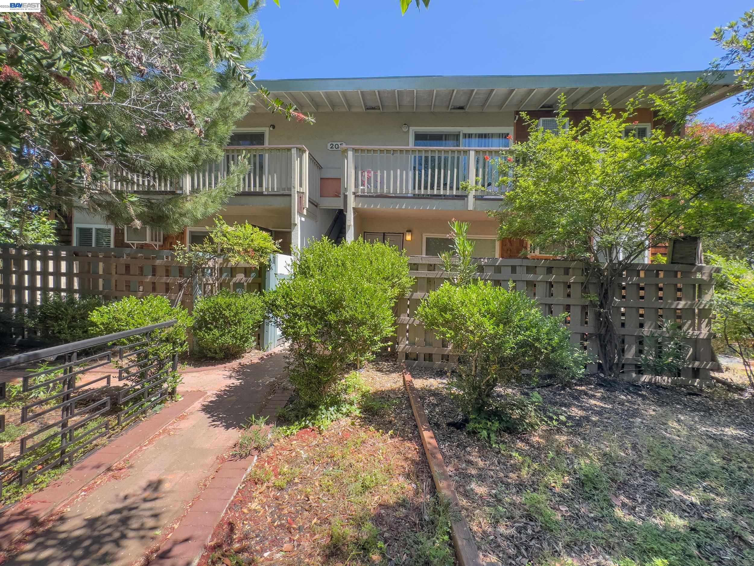 205 Muir Road Martinez, CA 94553 - Photo 3 of 20 a view of a house with a yard