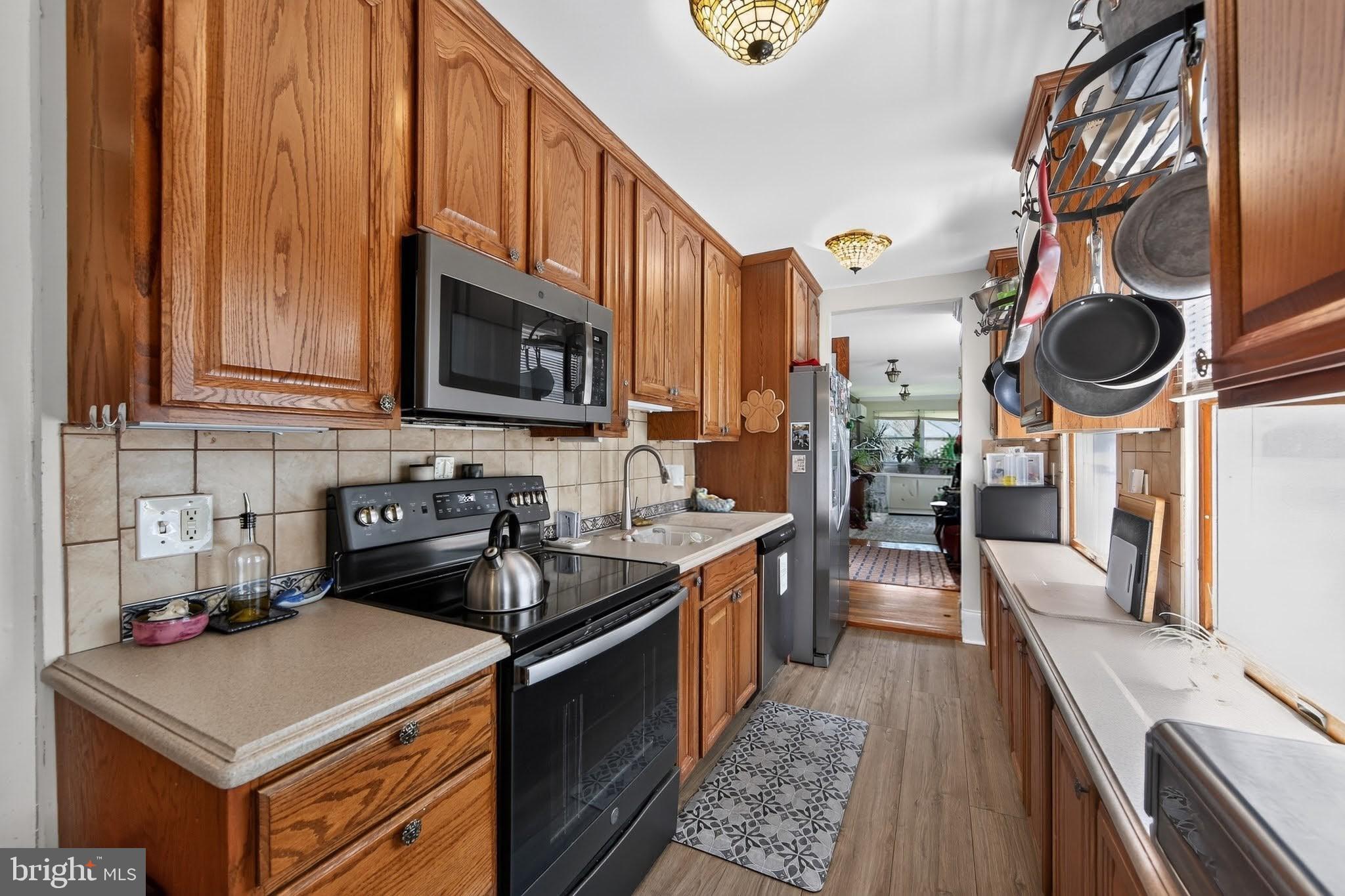 238 Brown Street Spring City, PA 19475 - Photo 12 of 57 Charming kitchen with warm wood tones.