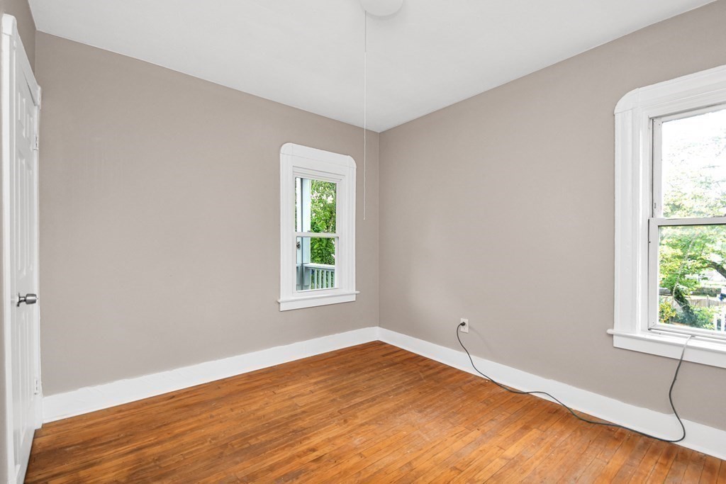335 Oakland Street Springfield, MA 01108 - Photo 26 of 42 an empty room with a window